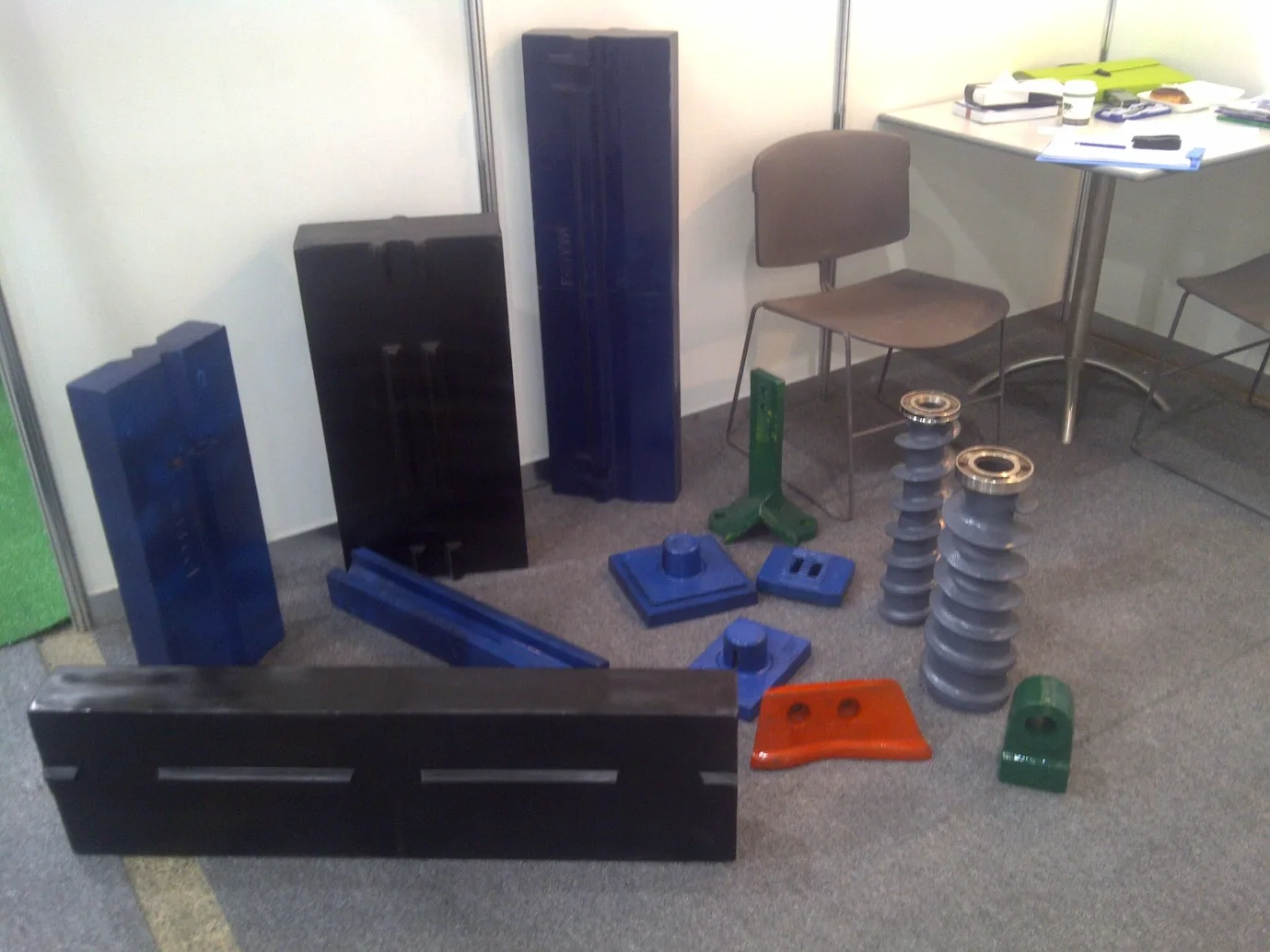 Melco Precisions exhibition stand with cast wear parts on display