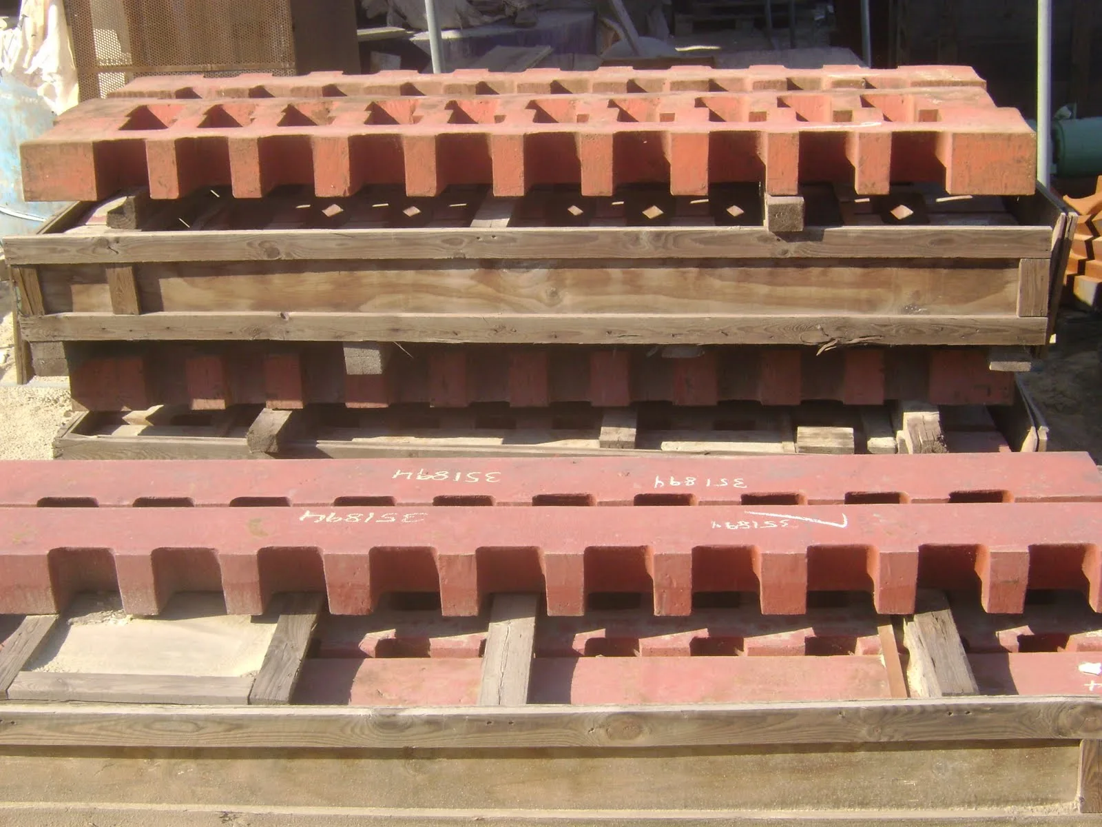 ELV shredder grates stacked in the yard